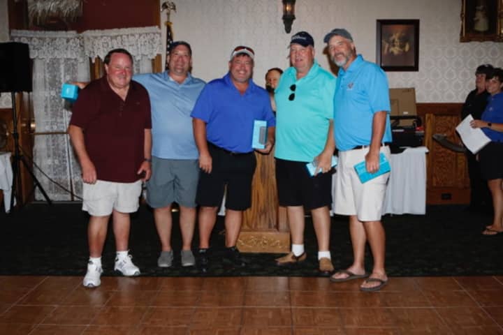 Bon Secours Community Hospital Golf Outing Chair and Bon Secours Community Hospital Foundation board member Dick McKeeby pictured (at left) with the winning foursome from Catskill Oral Surgery, led by Dr. Karl Krause.