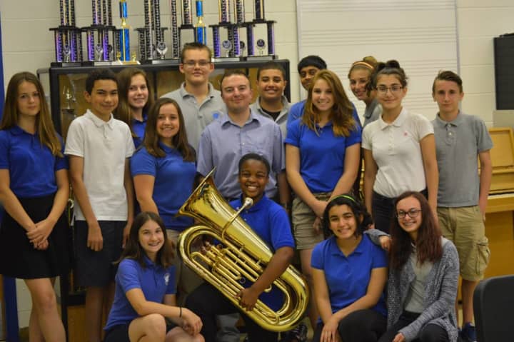Music students are shown with Don Lopuzzo who has been chosen as Best Educational Professional of the Month by Wallington Public Schools.