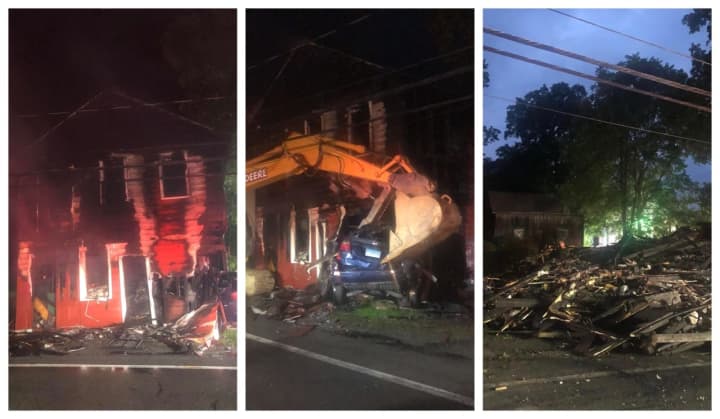 A historic building in the town of Wappinger was destroyed after a car slammed into it, sparking a large fire.