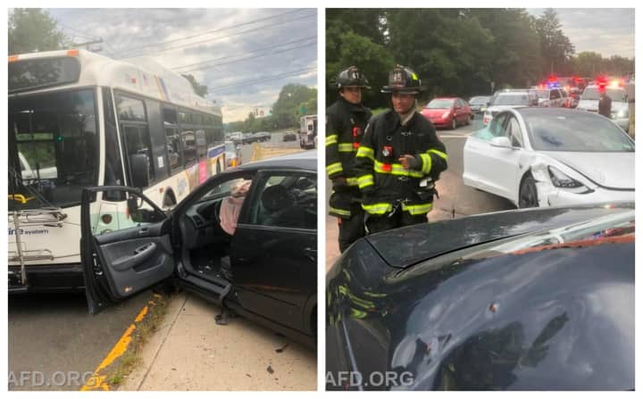 Three people were injured during a three-vehicle crash involving a bus.