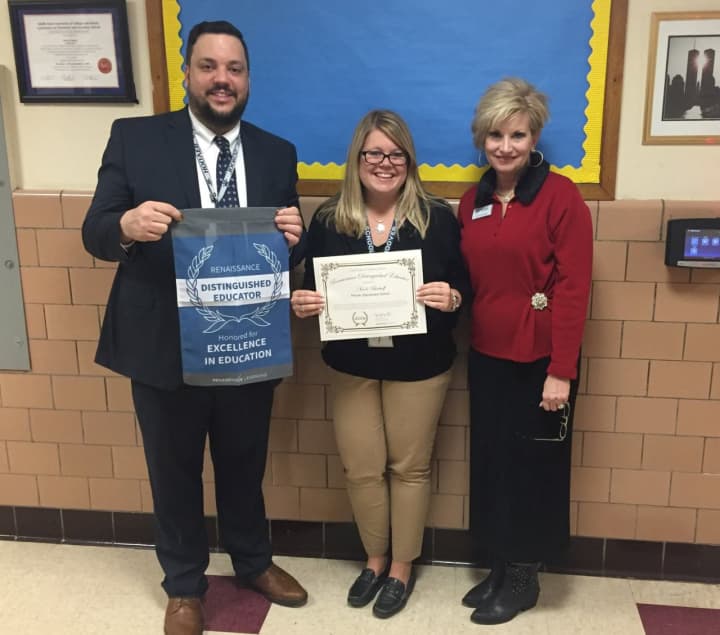 Bergenfield fourth grade teacher Nicole Bischoff has been named a Renaissance Distinguished Educator for using cloud-based educational supplements to accelerate student progress. From left, Principal William Fleming, Bischoff, and Cathy Keener.