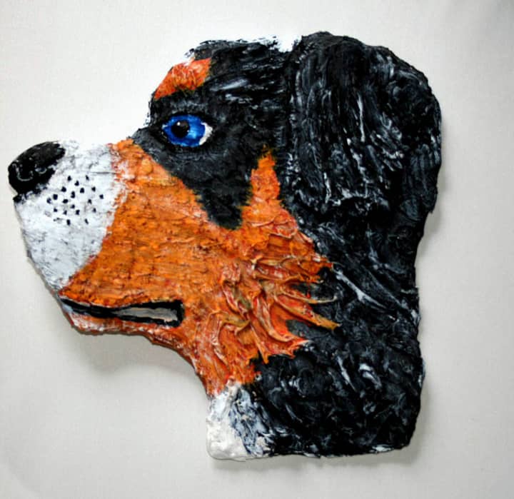 One of the interactive mix-and-match sculpture pieces by artist Honorah O&#x27;Neill, titled &quot;Bernese Mountain Dog Head.&quot;
