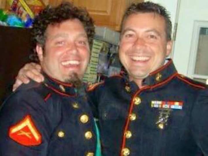 Marine Corps veterans Bill Perillo and Jim Wiltsie pose for a photo. 