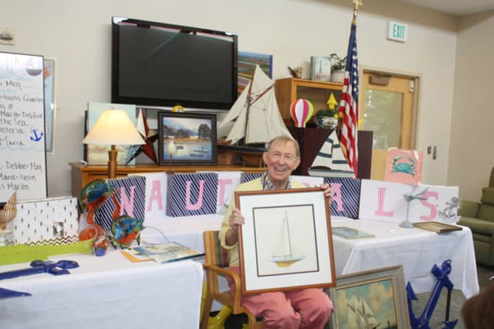 Bill Gray proudly presenting his nautical-themed program to Adult Day Program participants at Waveny LifeCare Network.