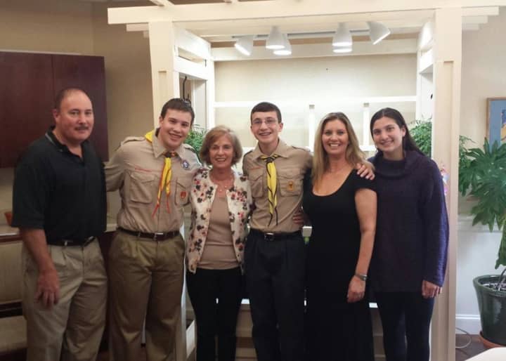 Steven Orientale with his family in front of the indoor garden he built at Atria Briarcliff. From left, his father (Michael), Steven, grandmother (Marta Cotler), brother (Sam), mother (Anna) and sister (Julia).