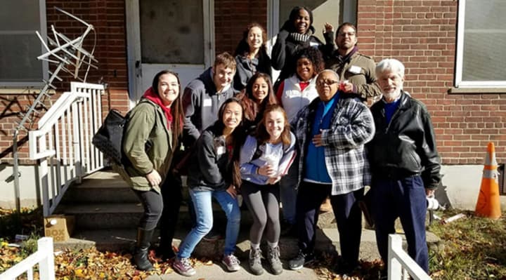 Sacred Heart University students and their professor assemble for a walking tour of Bridgeport&#x27;s South End neighborhood.