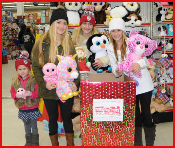 For the fifth straight year, Toys for Tots is being run by Bronxville school students. From left are Ircha sisters Jane, Sasha, Kirsten, and Caroline, official representatives of the 2015 campaign. 