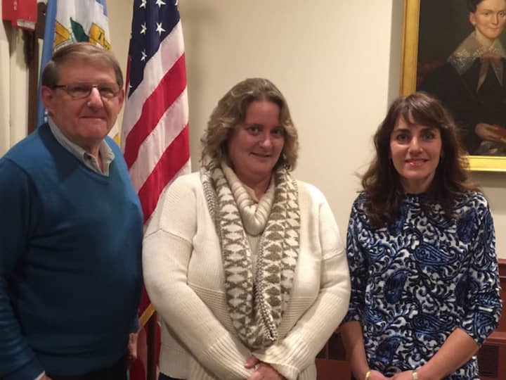 Brooke Valenti, center,a new member of the Weston Republican Town Committee, member, with board members Woody Bliss and Dawn Rivera.