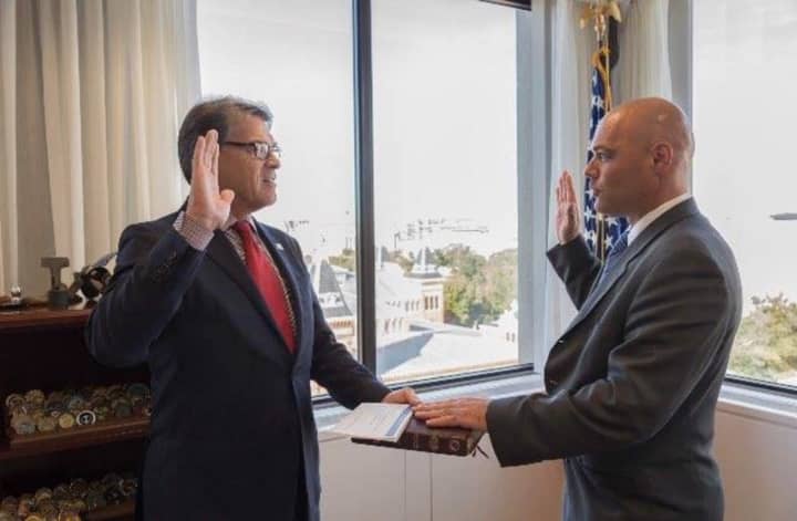 Bruce Walker gets sworn in by Rick Perry.