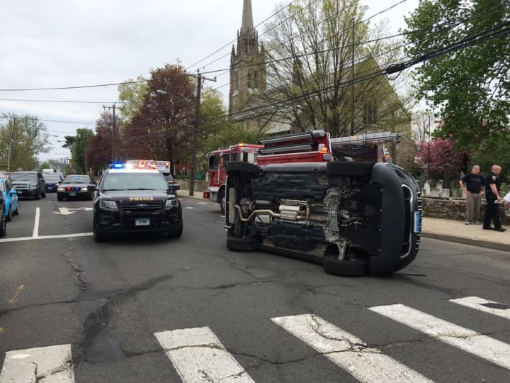 A Jeep rolled over near the intersection of Westport Avenue and East Avenue near St. Paul&#x27;s on the Green on Monday afternoon in Norwalk.