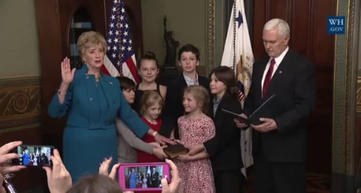 Linda McMahon of Greenwich is sworn in Tuesday by Vice President Mike Pence as the new head of the Small Business Administration.