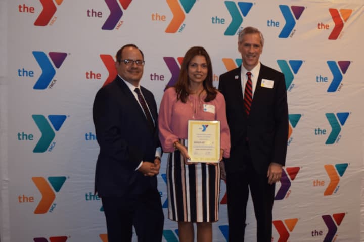 Pictured: John Cattelan, Connecticut Alliance of YMCAs executive director; Blanca Kazmierczak, honoree; and David Stevenson, Central Connecticut Coast YMCA president and CEO.