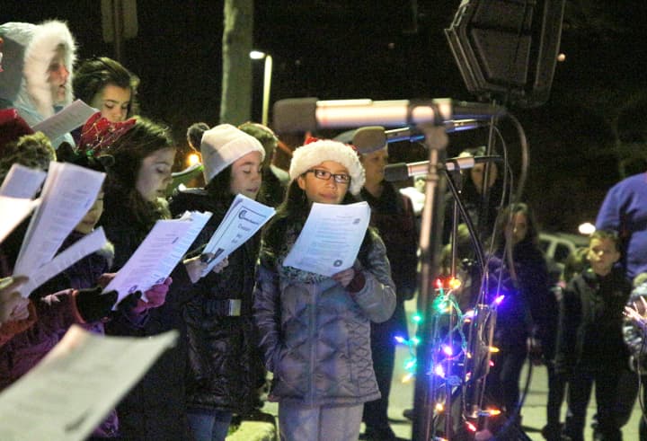 The Columbus Elementary School Troubadors performing at the Town of Mount Pleasant&#x27;s tree-lighting ceremony on Friday.