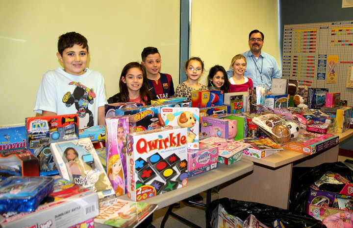 Students at Columbus Elementary participated in the school&#x27;s annual toy drive.