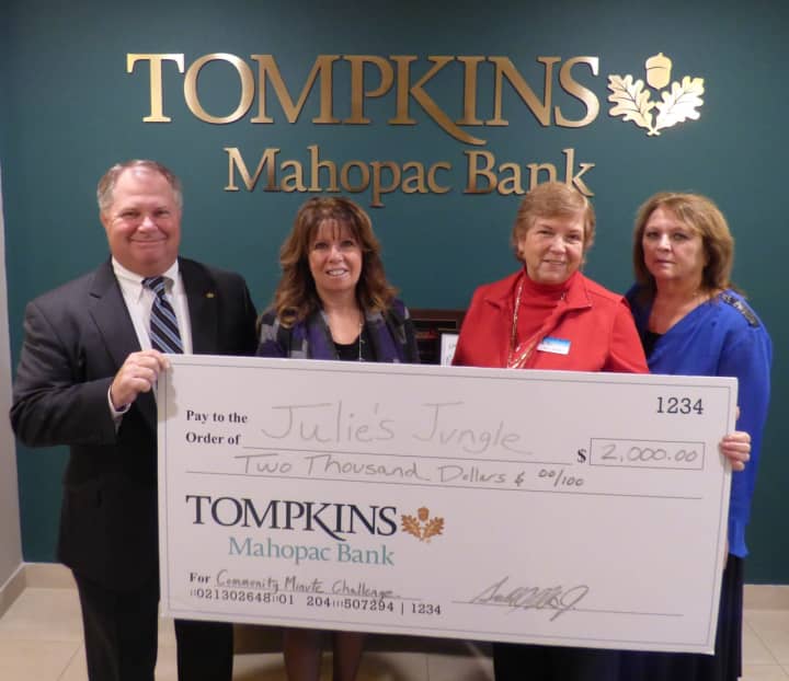 Pictured, from left: Jerry Klein, Tompkins Mahopac Bank president and CEO; Janet McHugh, Julie’s Jungle board member; Jean Breyer, Julie’s Jungle board member; and Pat Roden, Tompkins Mahopac Bank Branch Manager, Hopewell location.
