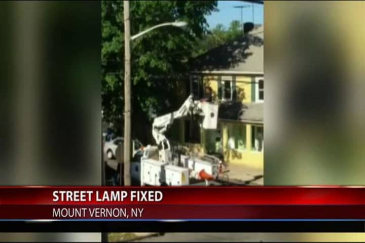 After months of complaints, broken street lamp gets repaired.