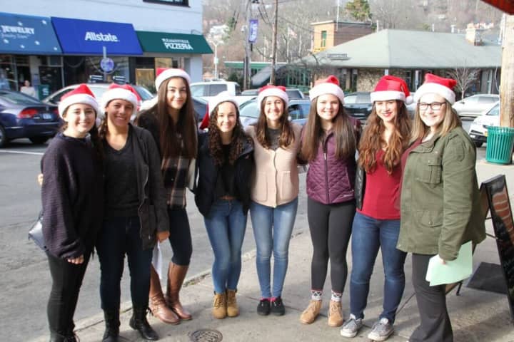 Plesantville High School&#x27;s Camerata sang Christmas carols at the Pleasantville Chamber of Commerce&#x27;s annual holiday event on Saturday.