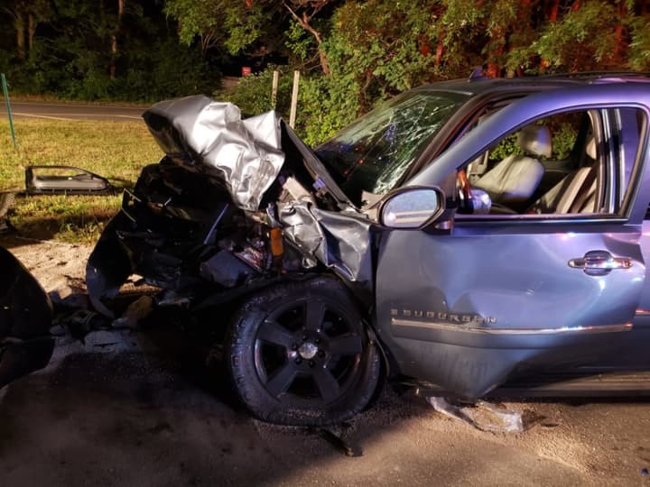 Two people were hospitalized following a crash at a Long Island intersection.