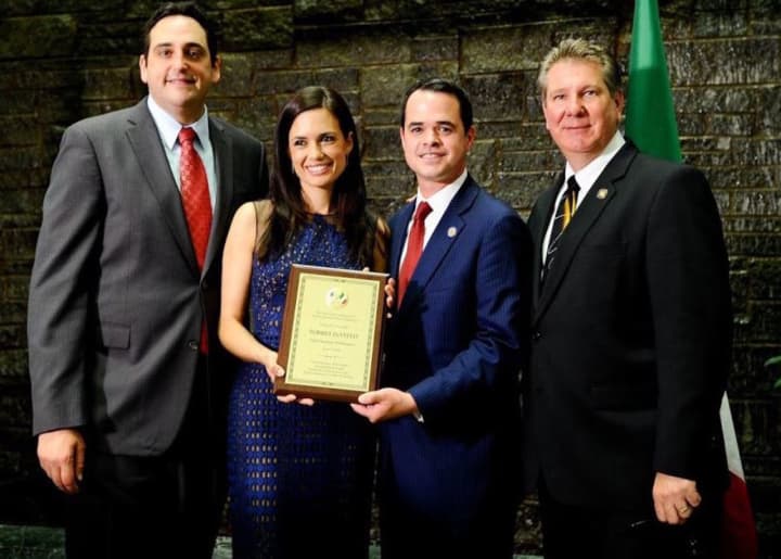 State Sen. David Carlucci presented an award to actress Torrey DeVitto at the New York Italian American Conference of State Legislators&#x27; Italian-American Day celebration in Albany.