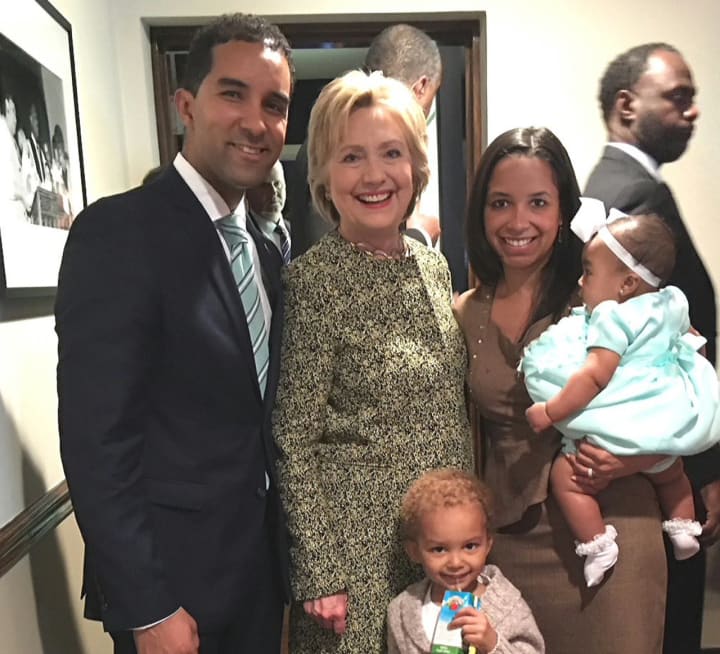 Mount Vernon Mayor Richard Thomas&#x27; family with presidential hopeful Hillary Clinton at Grace Baptist Church earlier this year.