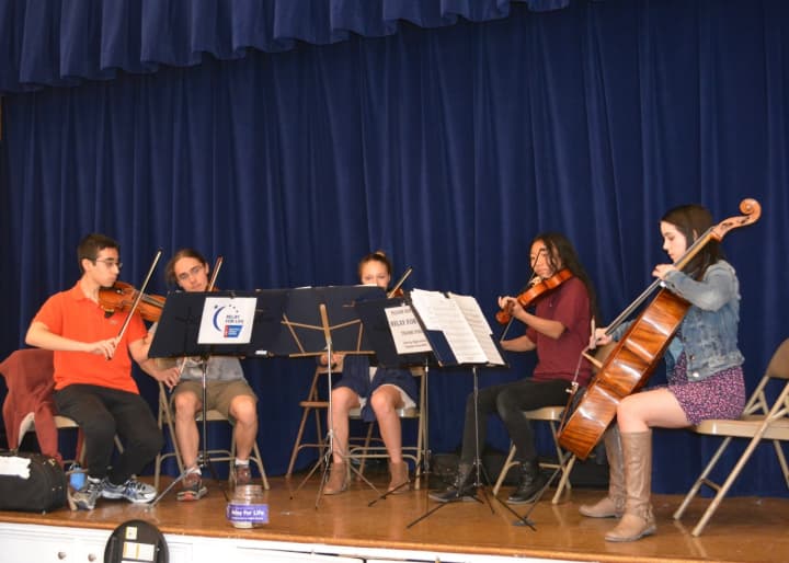 Members of John Jay High School’s Chamber Ensemble entertained shoppers at the Chappaqua Farmers Market and collected donations for the upcoming American Cancer Society Relay for Life and Tri-M Music Society.