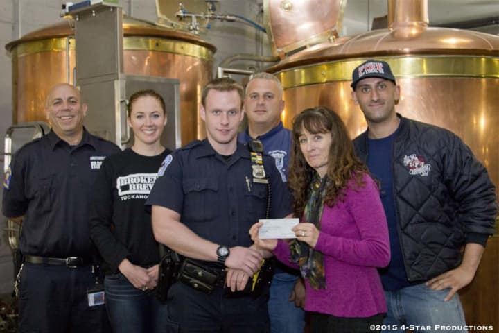 Winners of Chili Cookoff presented with check