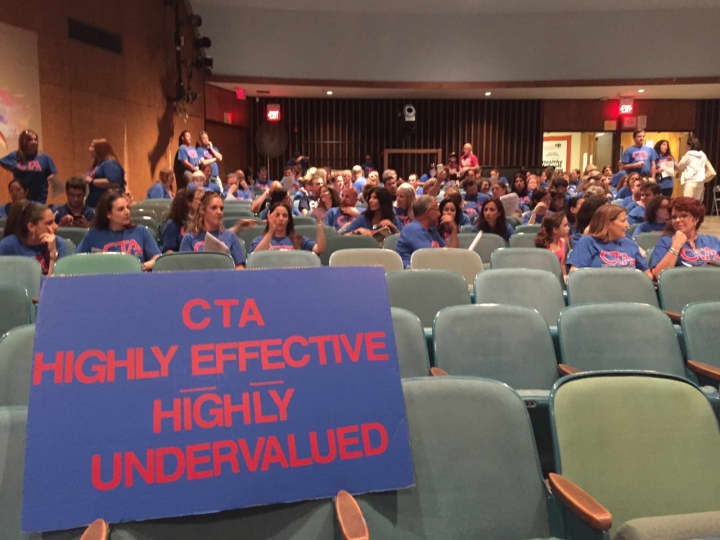 Members of the Clarkstown Teachers Association and supporters protested the lack of a new contract at a June 2 board of education meeting.
