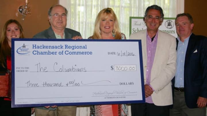 Photo above: Lauren Zisa, executive director of the Hackensack Regional Chamber of Commerce, Donald Perlman, director of the Hackensack Regional Chamber of Commerce, Linda Santucci, Dr. Richard Santucci and Ron Bergamini, president of The Columbians.