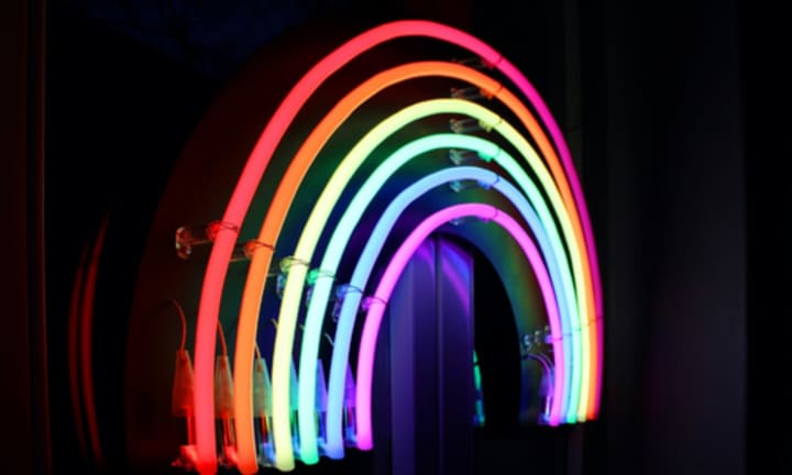 A rainbow neon sign.