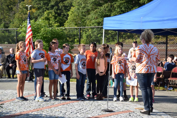 Pierre Van Cortlandt Middle School fifth-grade students performed “Together We Can Change the World” at the Croton-on-Hudson/Buchanan/Cortlandt 9/11 Memorial Service at Croton Landing Park on Friday.