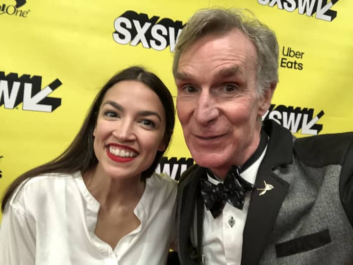 Alexandria Ocasio-Cortez took time to snap a selfie with Bill Nye at the event.