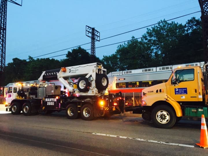 MTA crews with heavy-duty equipment are on the scene of the derailment Thursday evening in Rye, N.Y., Metro-North said.