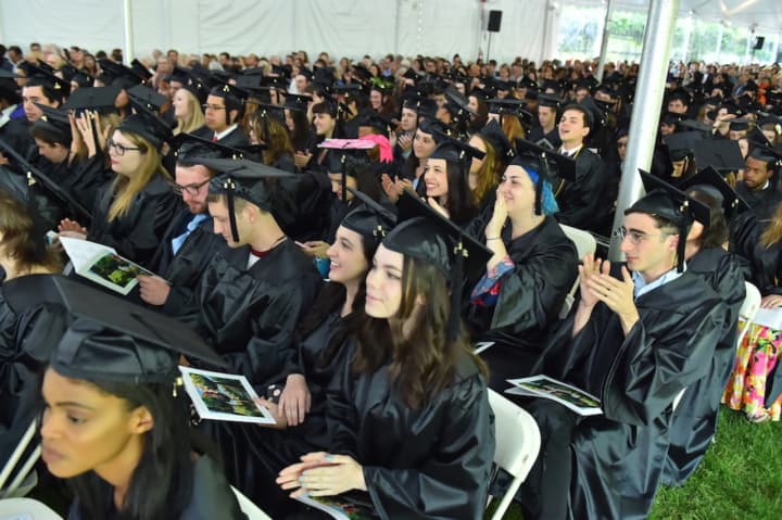 Members of Sarah Lawrence College’s class of 2016 listen to commencement speakers.