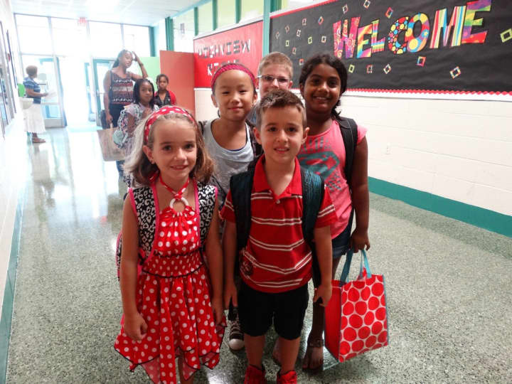 Students arrive for first day of school. 