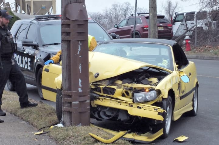 The yellow BMW convertible slammed into a utility pole on River Road in Fair Lawn on Thursday, Feb. 23.