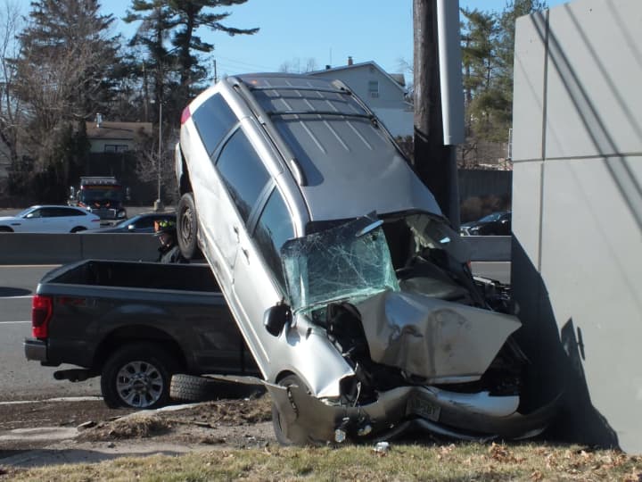 The minivan crashed nose-first into the ground on Route 4 in Paramus.