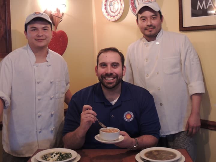 Gene Bazzarelli, general manager of Franco&#x27;s Metro, with two of his kitchen staff.