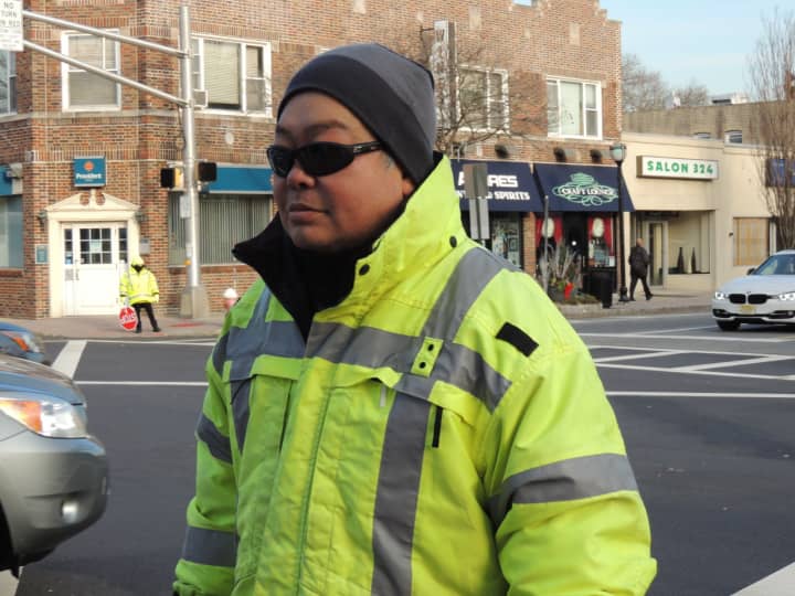 Leonia crossing guard Charlie Lee has the reputation of being both vigilant and fearless in protecting crossing children.