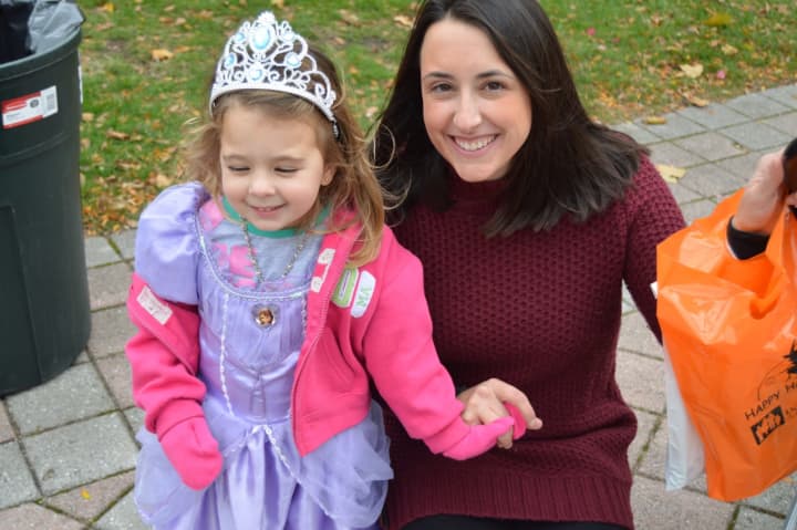 Kids dress up in costume for Halloween on the Green in Danbury.