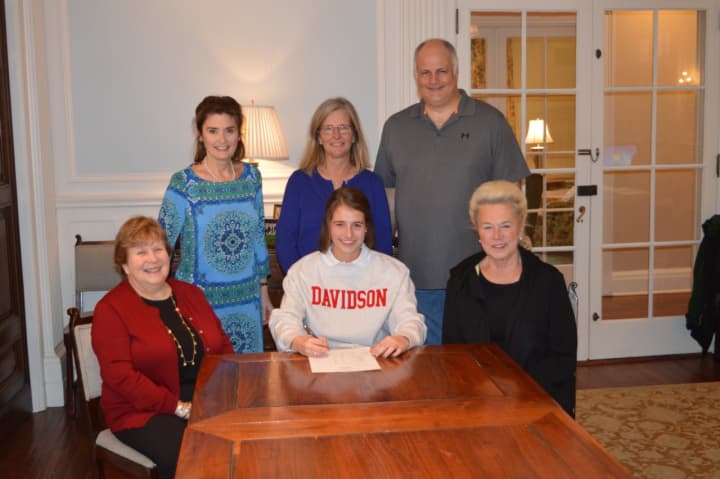 Convent of Sacred Heart Greenwich senior Tracey Hagan signs her national commitment letter Wednesday morning to join the women&#x27;s soccer team at Davidson College in North Carolina.