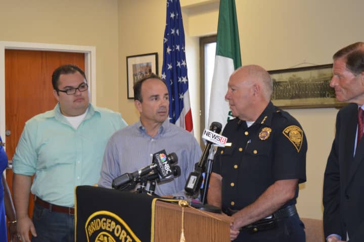 City Council member Anthony Paoletto, Mayor Joe Ganim, Police Chief AJ Perez and U.S. Sen. Richard Blumenthal discuss an ambush-style shooting Sunday morning in Bridgeport.