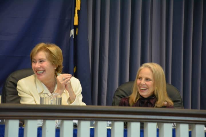 Mount Kisco Trustees Jean Farber (left) and Karen Schleimer (right), pictured at a recent village board meeting. The two were re-elected on Tuesday.