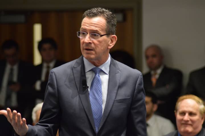 Governor Dannel Malloy addresses the audience in a town hall forum in Stamford Thursday evening.
