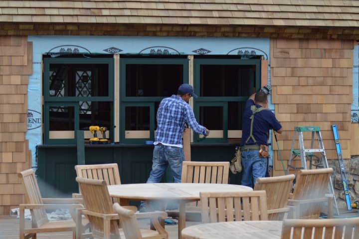 Workers put the finishing touches on the Sue H. Baker Pavilion at Tod&#x27;s Point in Greenwich on Tuesday.
