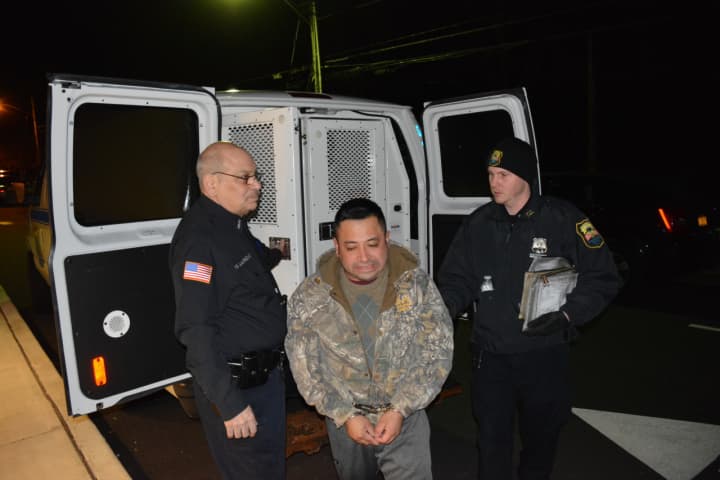 Hugo Ramirez-Morales gets out of a Westchester County Corrections van prior to his appearance in North Salem&#x27;s local court. Ramirez-Morales is one of two accused, along with a co-defendant, of stealing $30,000 worth of hay from Lois Colley&#x27;s estate.