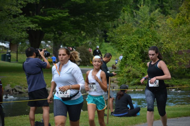 Runners in the 5K road race in Armonk, which is named in honor of Jamie Love.