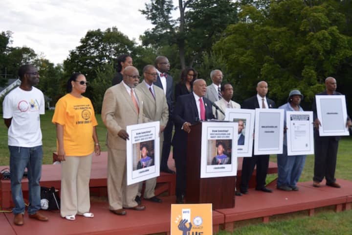 Members of the state and Norwalk chapters of the NAACP at a press conference in August announcing a new investigation into the death of Redding lawyer Gugsa Abraham &quot;Abe&quot; Dabela, who died last year in Redding.
