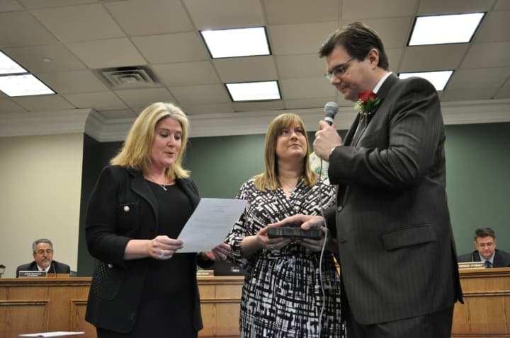 Assemblywoman Holly Schepisi swore in new Hillsdale council member Scott Karcich.