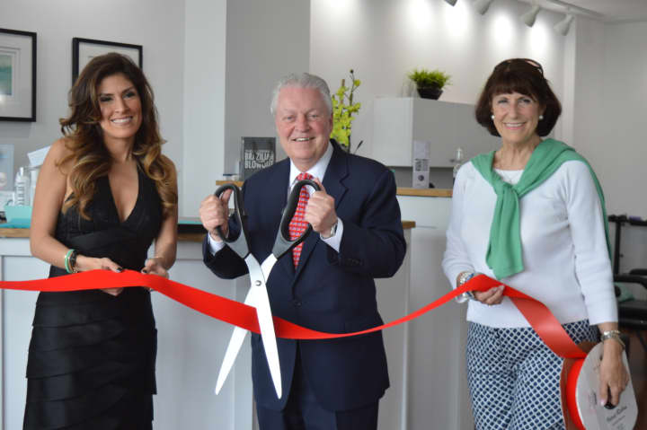 Owner Ella Sandin, First Selectman Michael Tetreau and Fairfield Chamber of Commerce President Beverly Balaz celebrate the opening of CKC Salon&#x27;s second Fairfield location on Black Rock Turnpike in Fairfield.
