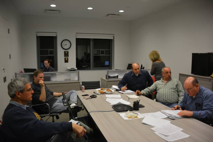 The Millwood Board of Fire Commissioners voted on Monday to table a proposed contract with cell-tower developer Homeland Towers.